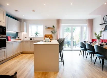 Modern kitchen and dining room in a home in Farehurst Park development