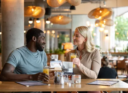 Man and woman in a restaurant in Eddington