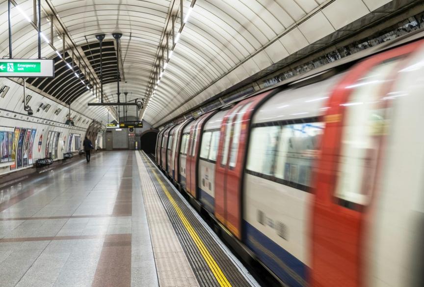 Underground train arriving at a tube station