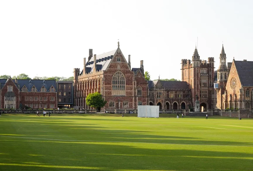 Exterior of playing fields and historical school buildings in Bristol