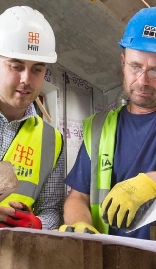 two individuals working
