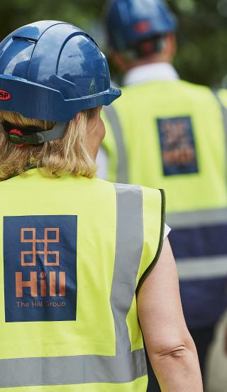 Women on site wearing Hill PPE