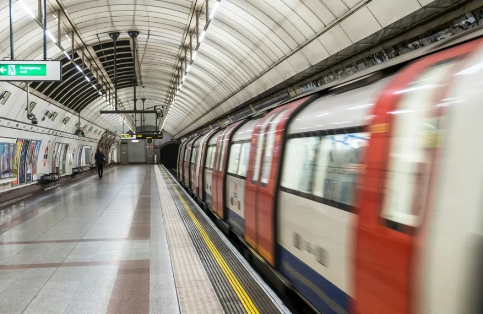 Underground train arriving at a tube station