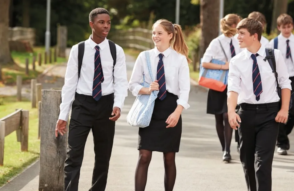 School children in uniform walking together