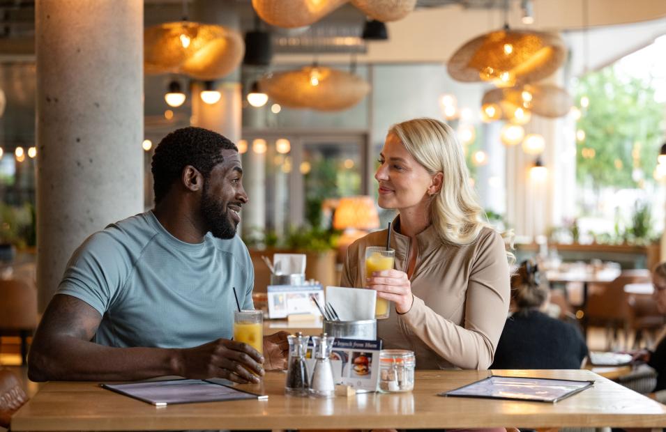 Man and woman in a restaurant in Eddington
