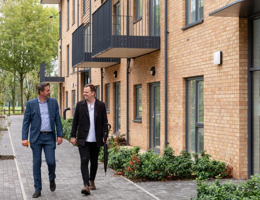 Two men walking at Seasprite Close