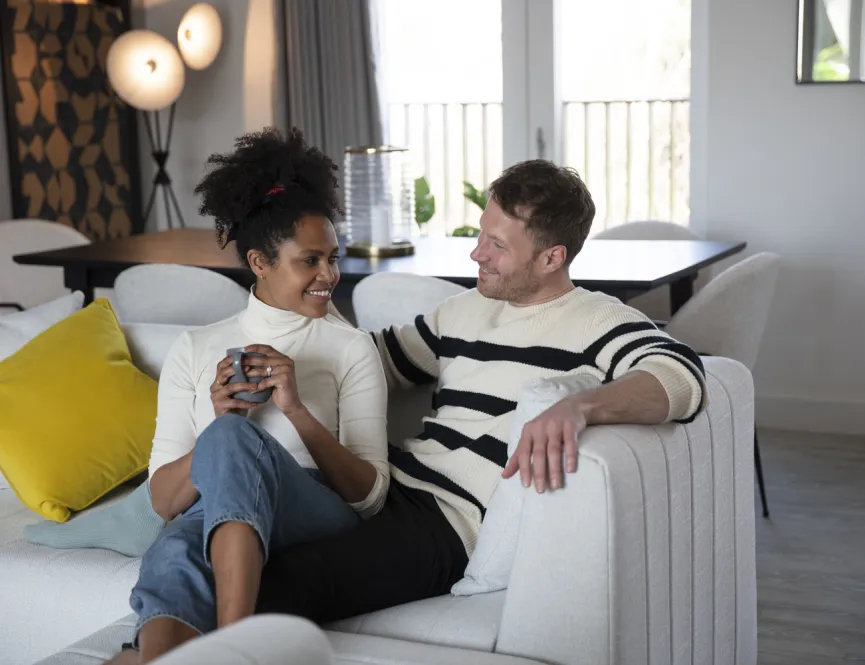 Couple sitting on sofa